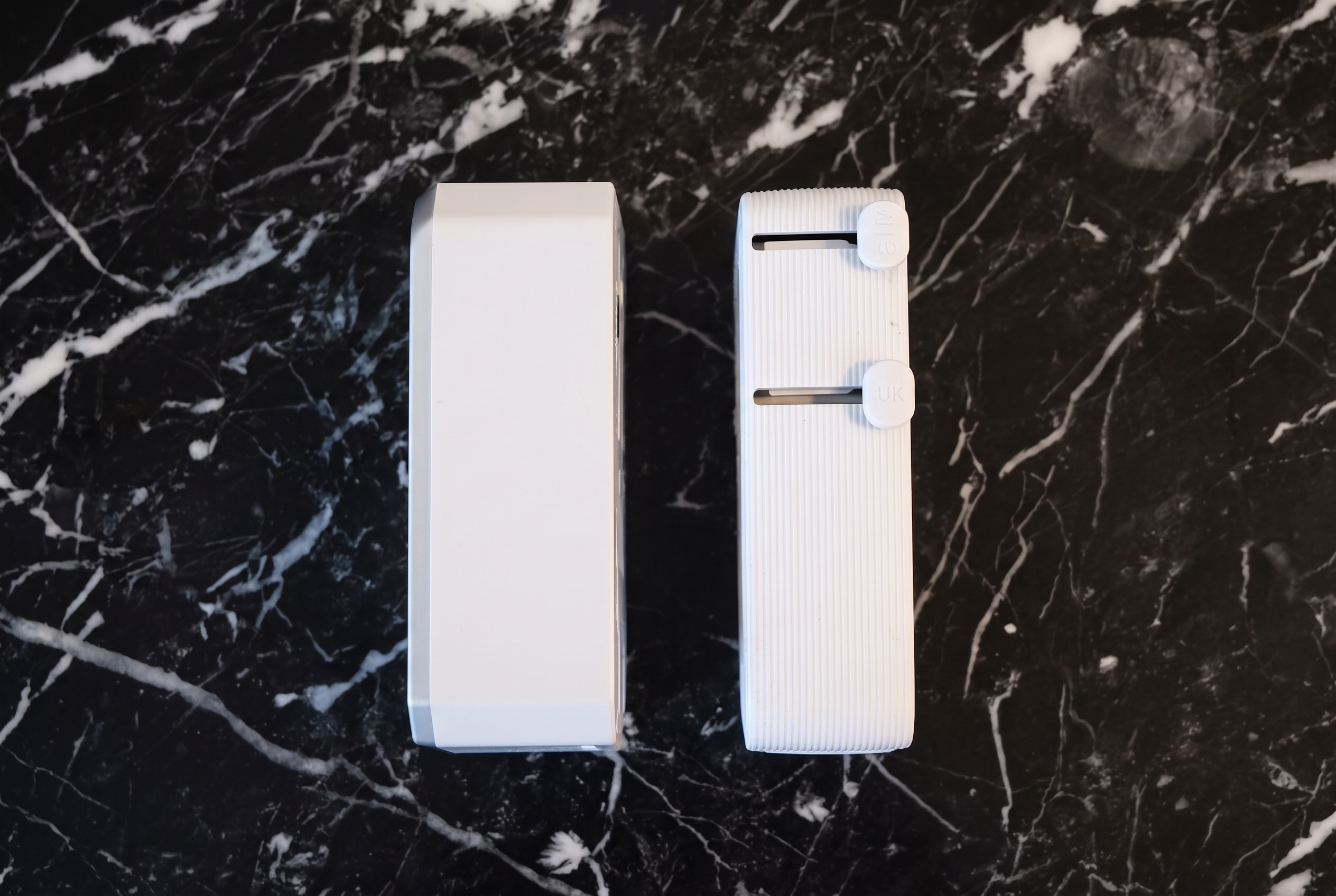 Side view of the EPICKA Air 40W and Anker Nano Travel Adapter side by side